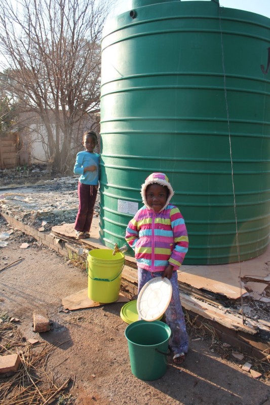 Since August 2013 when Blyvoor Mine was placed under provisional liquidation, conditions at the mine has gone from bad to worse. These photos were taken during a visit to some buildings stripped by illegal miners and metal thieves last year August.