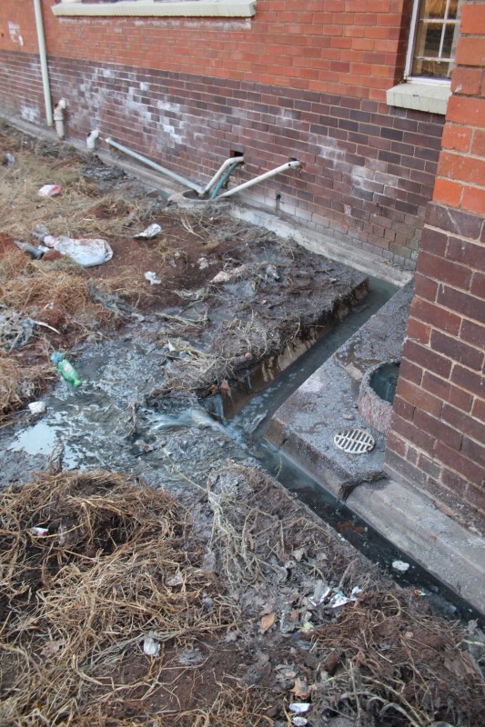 Since August 2013 when Blyvoor Mine was placed under provisional liquidation, conditions at the mine has gone from bad to worse. These photos were taken during a visit to some buildings stripped by illegal miners and metal thieves last year August.