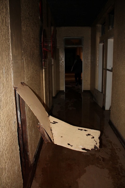 Since August 2013 when Blyvoor Mine was placed under provisional liquidation, conditions at the mine has gone from bad to worse. These photos were taken during a visit to some buildings stripped by illegal miners and metal thieves last year August.