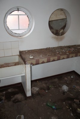 Since August 2013 when Blyvoor Mine was placed under provisional liquidation, conditions at the mine has gone from bad to worse. These photos were taken during a visit to some buildings stripped by illegal miners and metal thieves last year August.