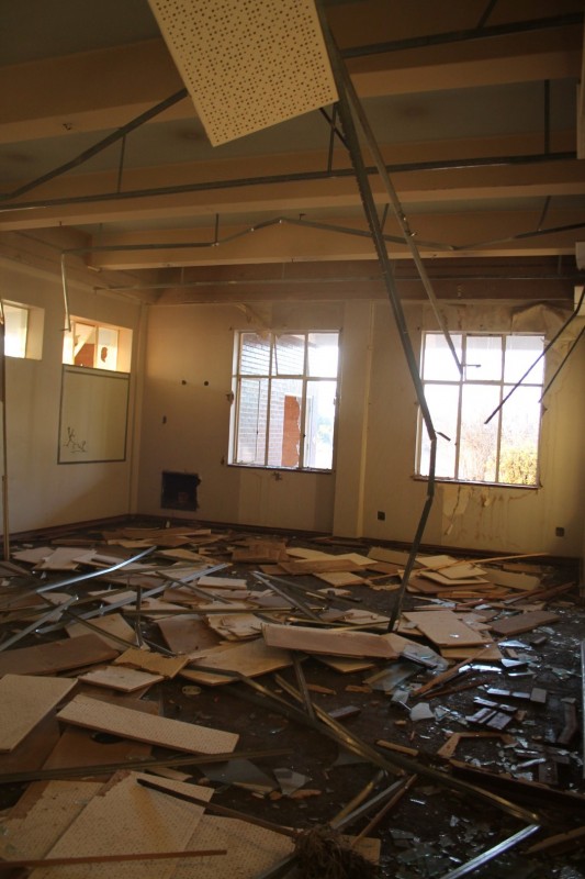 Since August 2013 when Blyvoor Mine was placed under provisional liquidation, conditions at the mine has gone from bad to worse. These photos were taken during a visit to some buildings stripped by illegal miners and metal thieves last year August.