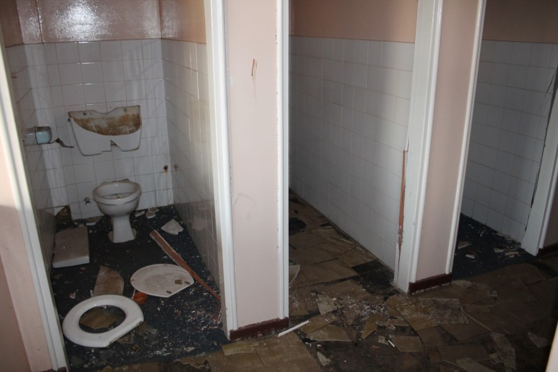 Since August 2013 when Blyvoor Mine was placed under provisional liquidation, conditions at the mine has gone from bad to worse. These photos were taken during a visit to some buildings stripped by illegal miners and metal thieves last year August.