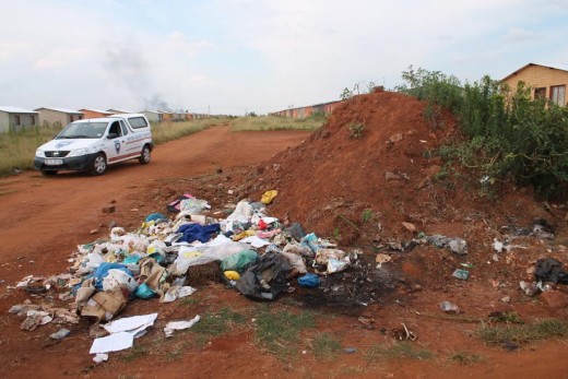 One of several open manholes, here being pointed out by Mr Elias Mcheteki.