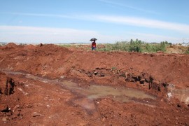 Stinking sewage bubbling to the top of the ground which appears to havebeen piled on top of the leak.
