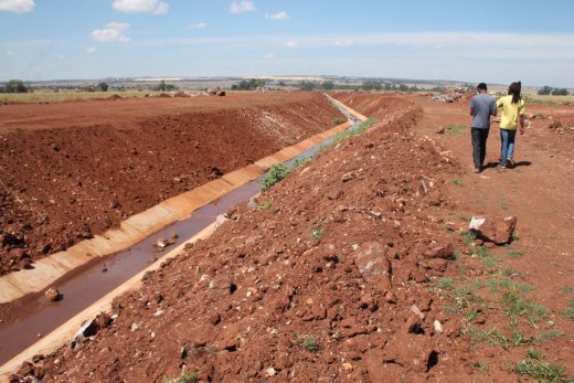 The sewage streams down one of the new storm water channels into the Wonderfonteinspruit.